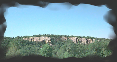 View of 'the Nose' rock formation in hills of Nordic Area