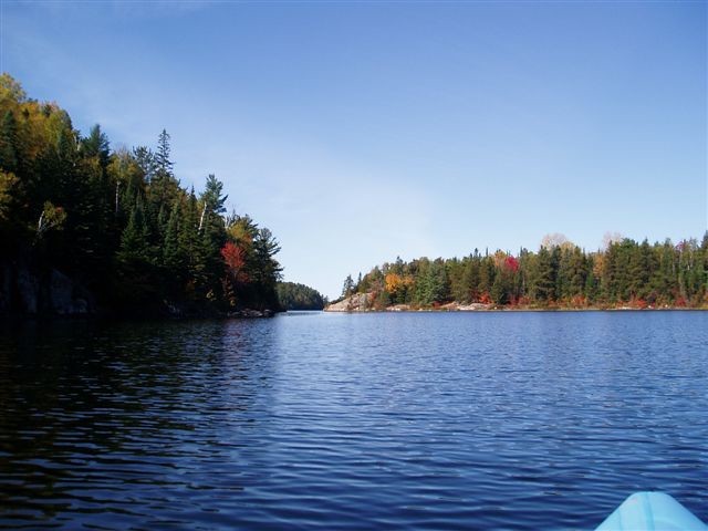 Fall colours on Nordic Lake, photo by Linda Currie